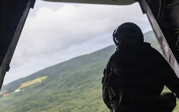 U.S. Marines and Sailors with III Medical Battalion Conduct a Simulated Casualty Evacuation