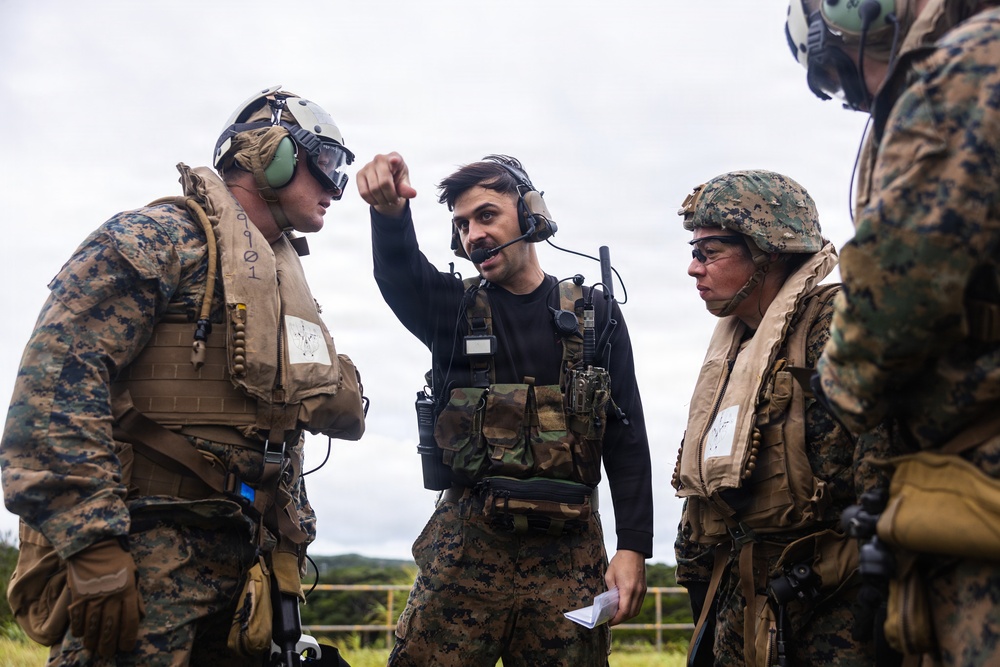 U.S. Marines and Sailors with III Medical Battalion Conduct a Simulated Casualty Evacuation