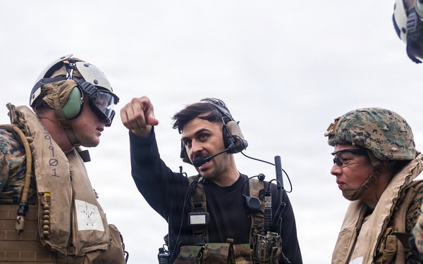 U.S. Marines and Sailors with III Medical Battalion Conduct a Simulated Casualty Evacuation