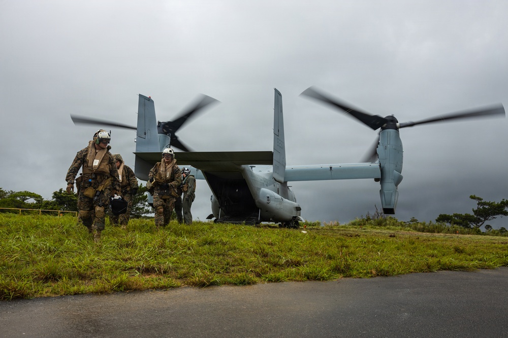 U.S. Marines and Sailors with III Medical Battalion Conduct a Simulated Casualty Evacuation
