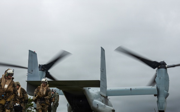 U.S. Marines and Sailors with III Medical Battalion Conduct a Simulated Casualty Evacuation