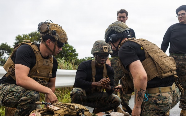 U.S. Marines and Sailors with III Medical Battalion Conduct a Simulated Casualty Evacuation