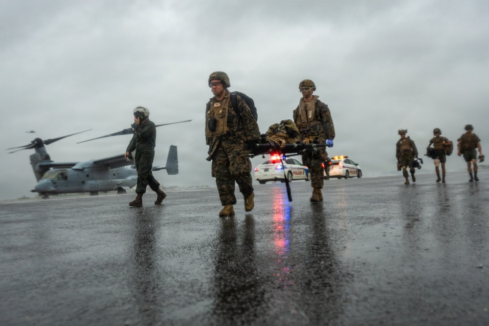 U.S. Marines and Sailors with III Medical Battalion Conduct a Simulated Casualty Evacuation