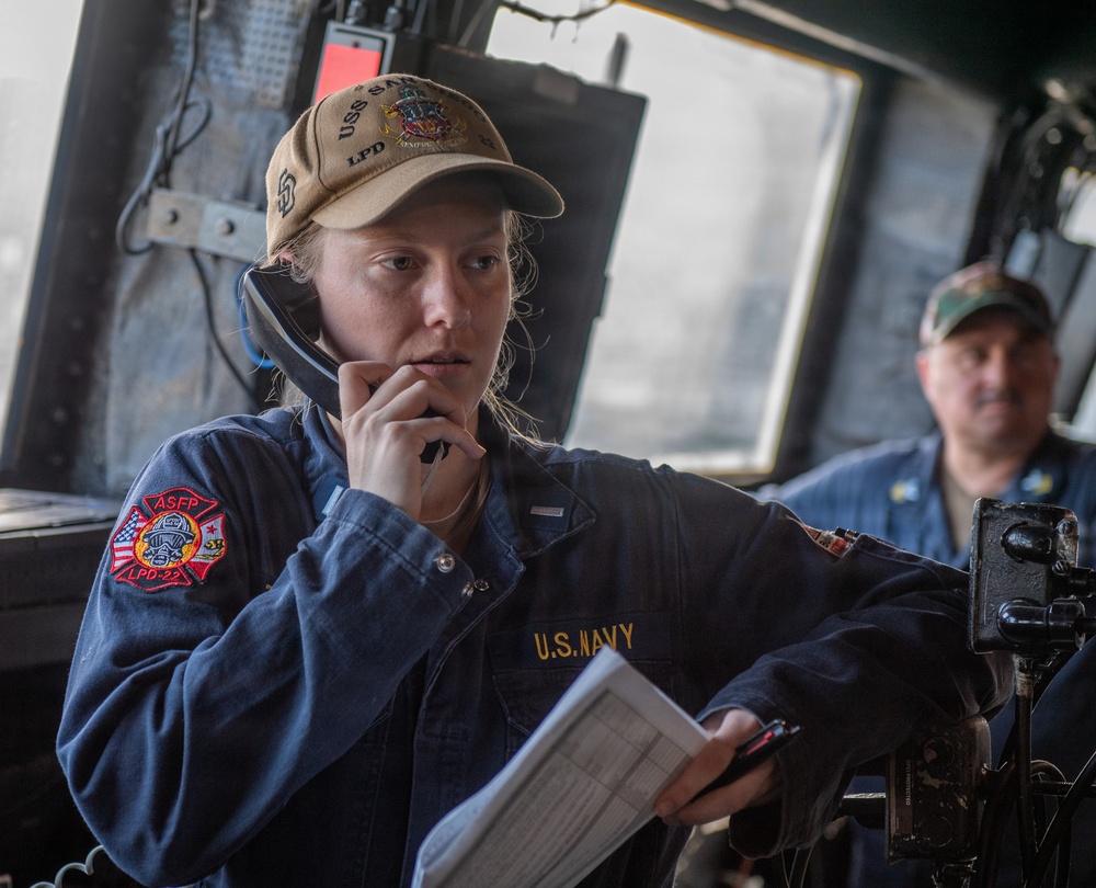 Sailor relays message during watch