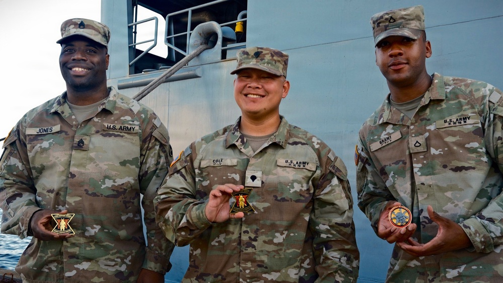 Service Members and Civilians Assigned to the 10th Support Group Receive Challenge Coins
