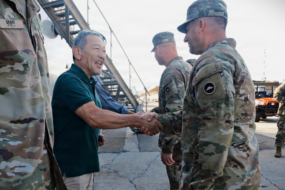 Service Members and Civilians Assigned to the 10th Support Group Receive Challenge Coins