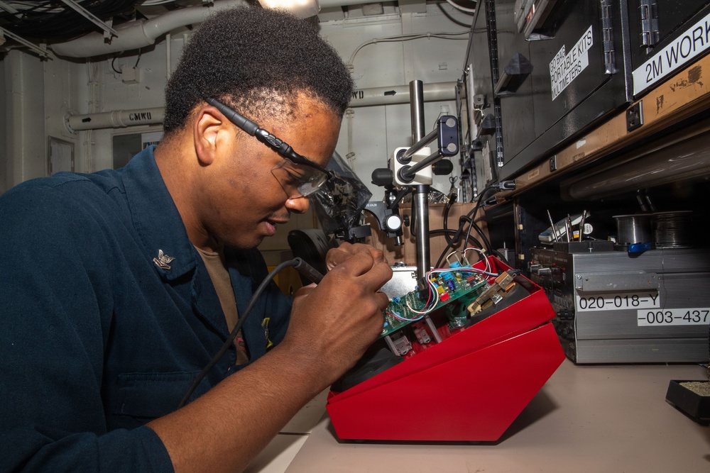 George Washington Sailor Maintains a Telecommunications System