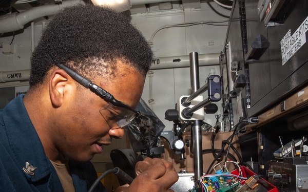 George Washington Sailor Maintains a Telecommunications System