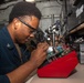 George Washington Sailor Maintains a Telecommunications System