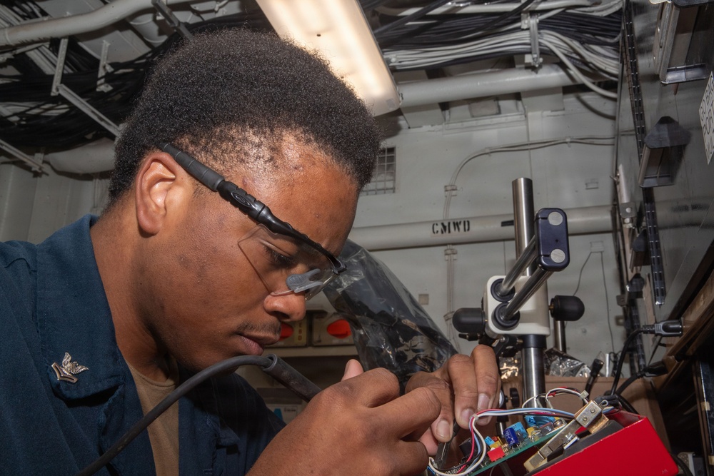 George Washington Sailor Maintains a Telecommunications System