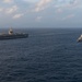 HMAS Perth Sails Alongside USS George Washington in the South China Sea