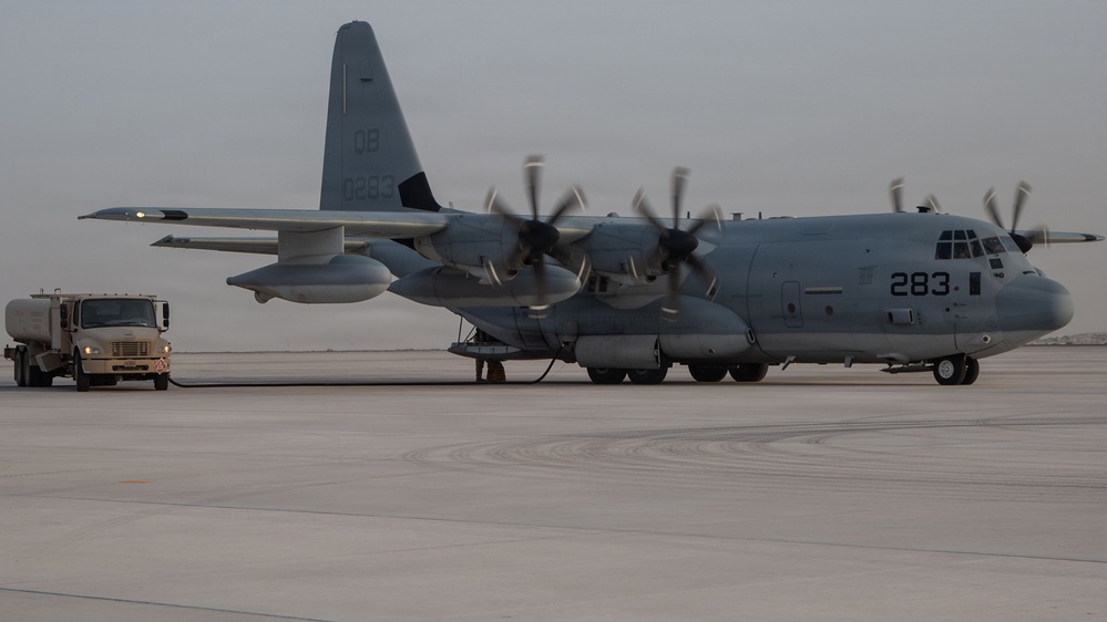 Marines onload equipment onto a KC-130J Super Hercules