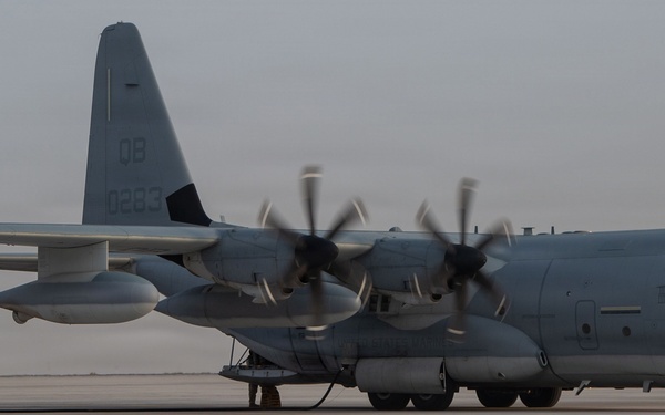 Marines onload equipment onto a KC-130J Super Hercules