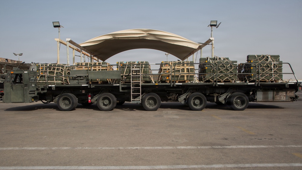Marines onload equipment onto a KC-130J Super Hercules