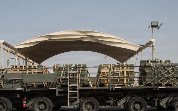 Marines onload equipment onto a KC-130J Super Hercules