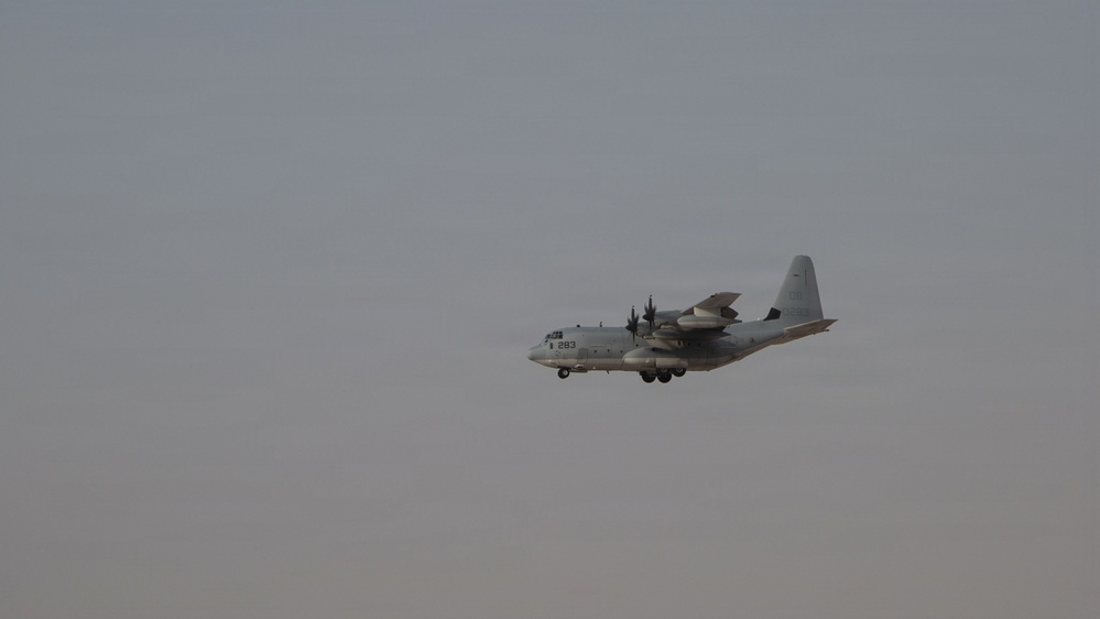 Marines onload equipment onto a KC-130J Super Hercules