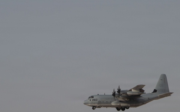 Marines onload equipment onto a KC-130J Super Hercules