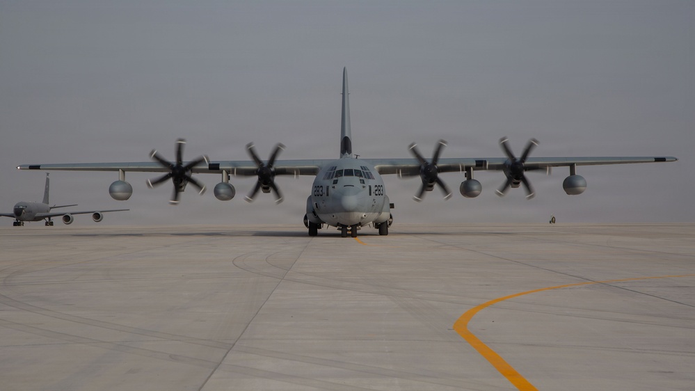 Marines onload equipment onto a KC-130J Super Hercules