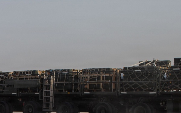 Marines onload equipment onto a KC-130J Super Hercules