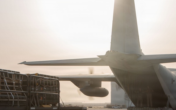 Marines onload equipment onto a KC-130J Super Hercules