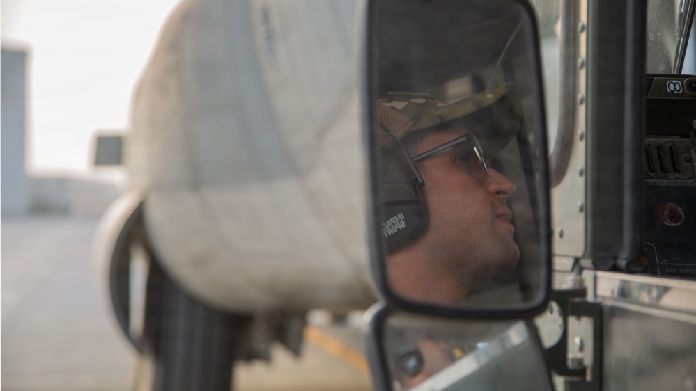Marines onload equipment onto a KC-130J Super Hercules