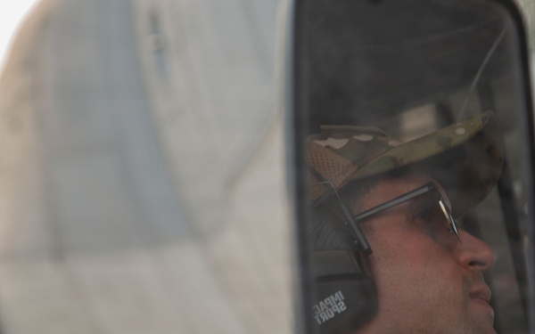 Marines onload equipment onto a KC-130J Super Hercules