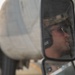 Marines onload equipment onto a KC-130J Super Hercules