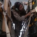 Marines onload equipment onto a KC-130J Super Hercules