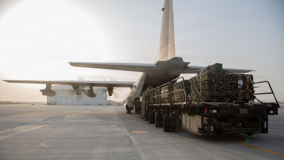 Marines onload equipment onto a KC-130J Super Hercules