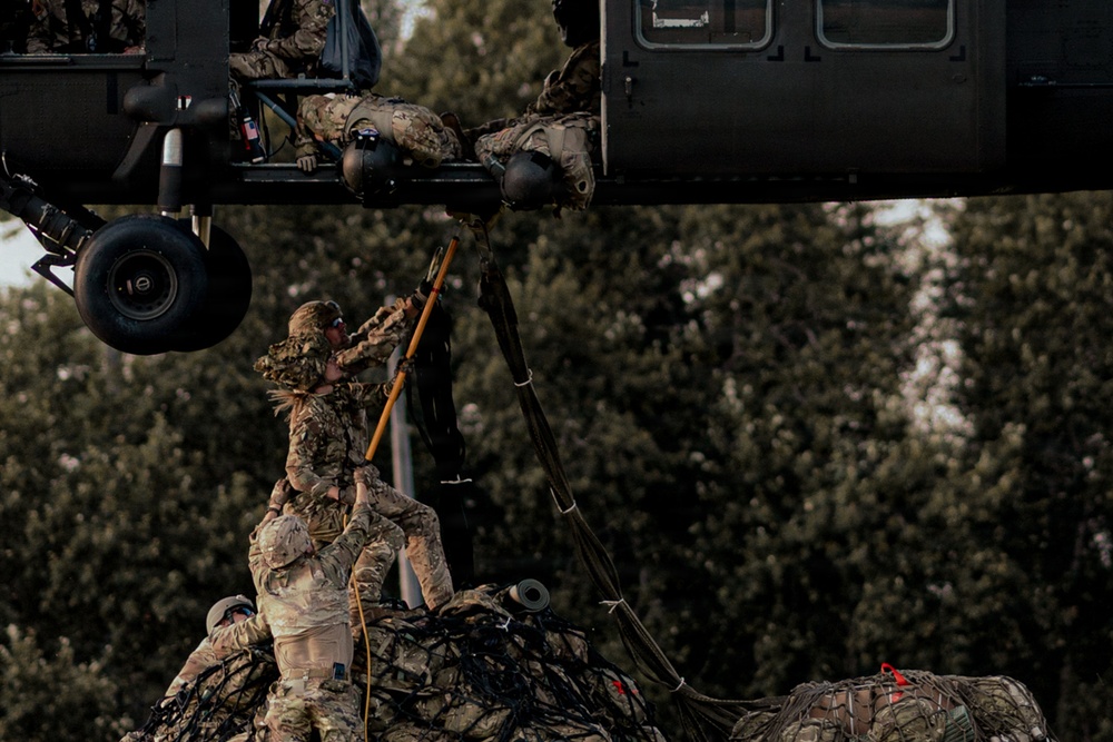 Illinois Army National Guard Black Hawk Crew Conducts Sling Load Resupply at Camp Grayling