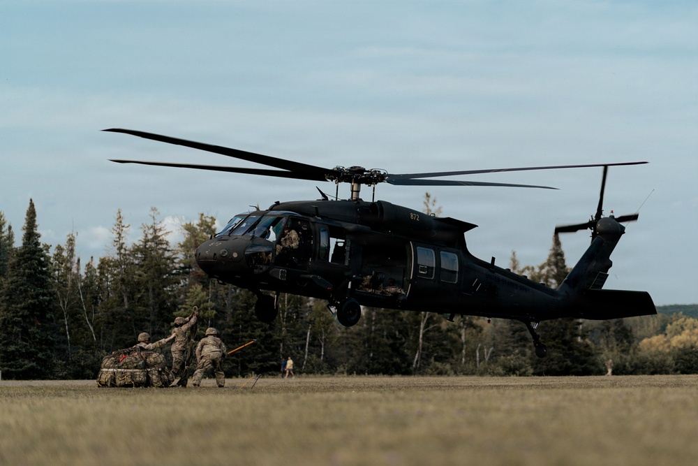 Illinois Army National Guard Black Hawk Crew Conducts Sling Load Resupply at Camp Grayling