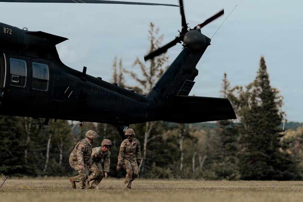 Illinois Army National Guard Black Hawk Crew Conducts Sling Load Resupply at Camp Grayling