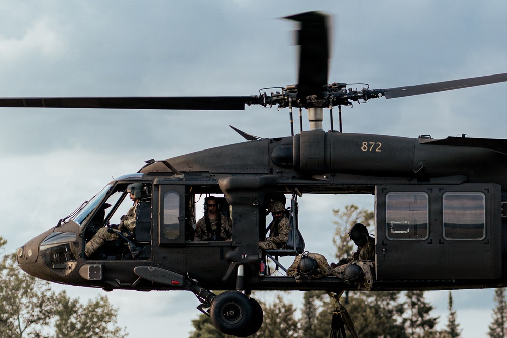 Illinois Army National Guard Black Hawk Crew Conducts Sling Load Resupply at Camp Grayling