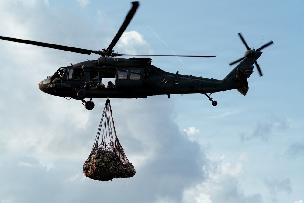Illinois Army National Guard Black Hawk Crew Conducts Sling Load Resupply at Camp Grayling