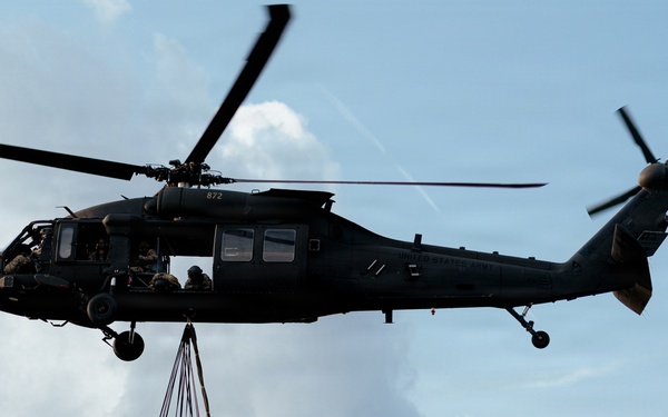Illinois Army National Guard Black Hawk Crew Conducts Sling Load Resupply at Camp Grayling