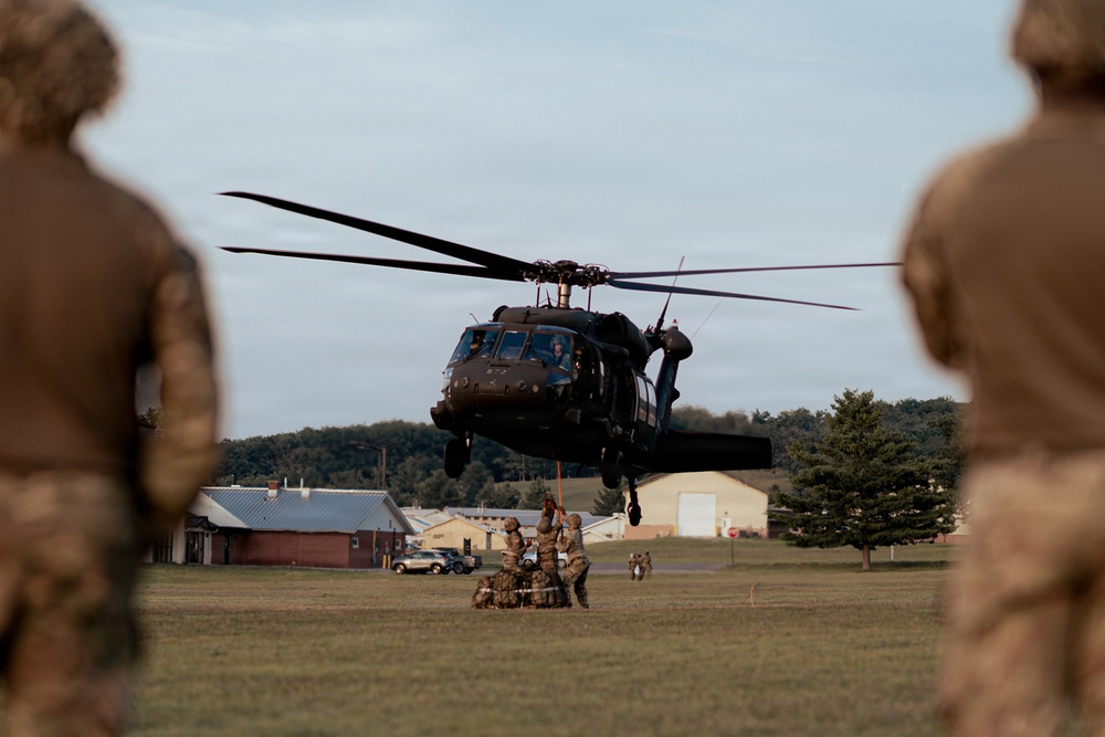 Illinois Army National Guard Black Hawk Crew Conducts Sling Load Resupply at Camp Grayling