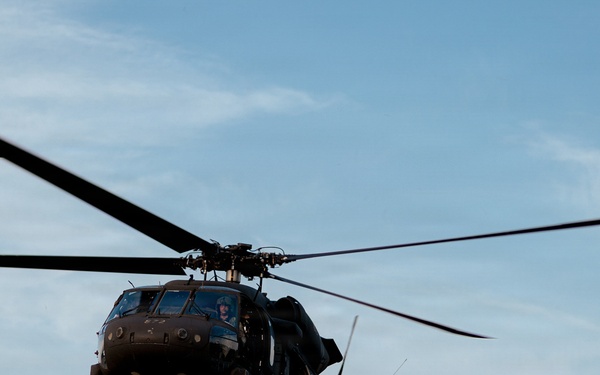 Illinois Army National Guard Black Hawk Crew Conducts Sling Load Resupply at Camp Grayling
