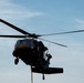 Illinois Army National Guard Black Hawk Crew Conducts Sling Load Resupply at Camp Grayling