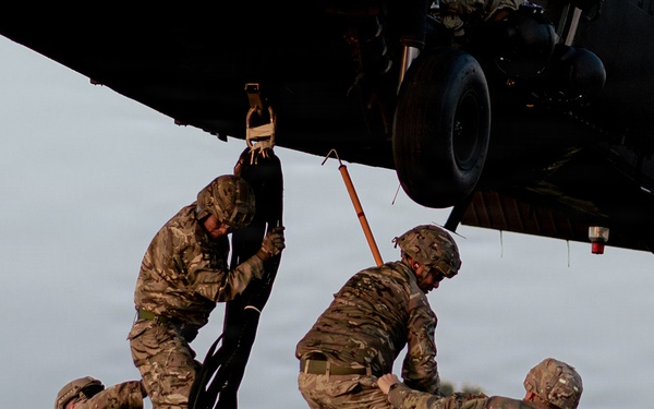 Illinois Army National Guard Black Hawk Crew Conducts Sling Load Resupply at Camp Grayling