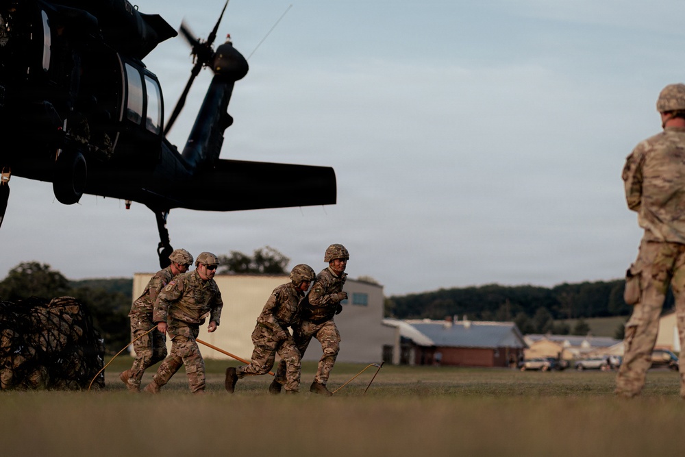 Illinois Army National Guard Black Hawk Crew Conducts Sling Load Resupply at Camp Grayling