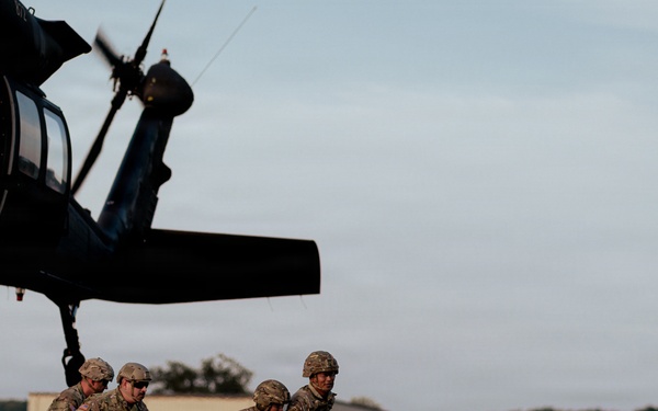 Illinois Army National Guard Black Hawk Crew Conducts Sling Load Resupply at Camp Grayling