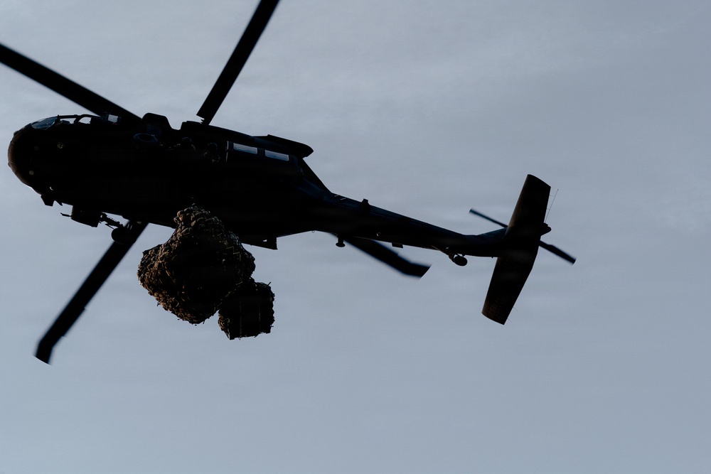 Illinois Army National Guard Black Hawk Crew Conducts Sling Load Resupply at Camp Grayling