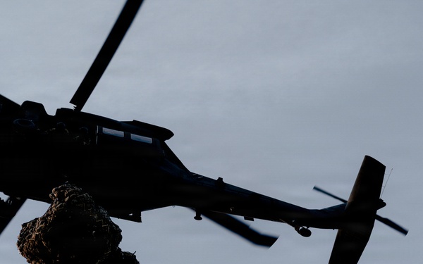 Illinois Army National Guard Black Hawk Crew Conducts Sling Load Resupply at Camp Grayling