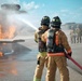Navy Reserve Commander, Navy Installations Command Fire and Emergency Services Detachment Charlie train using the Mobile Aircraft Fire Trainer Device here at Naval Air Station Jacksonville.