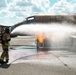 Navy Reserve Commander, Navy Installations Command Fire and Emergency Services Detachment Charlie train using the Mobile Aircraft Fire Trainer Device here at Naval Air Station Jacksonville.