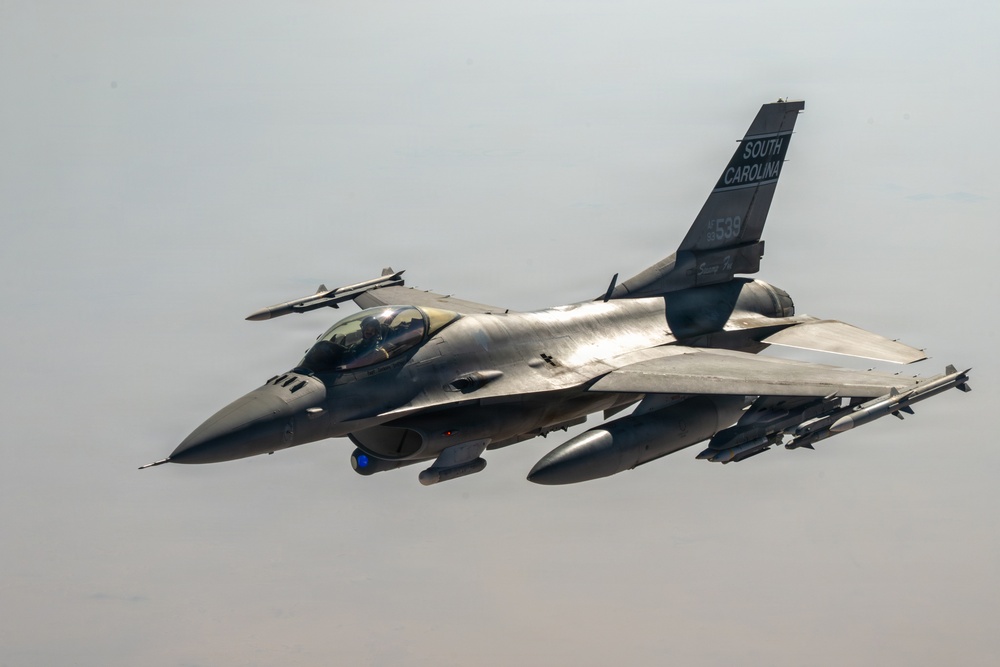 KC-135 refuels F16s for CENTCOM security