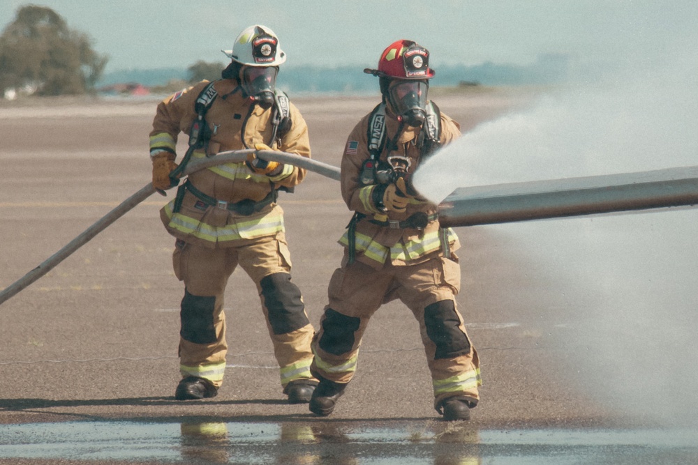Firefighters from the 125th Fighter Wing of the Florida Air National Guard train using the Mobile Aircraft Fire Trainer Device here at Naval Air Station Jacksonville
