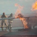 Firefighters from the 125th Fighter Wing of the Florida Air National Guard train using the Mobile Aircraft Fire Trainer Device here at Naval Air Station Jacksonville