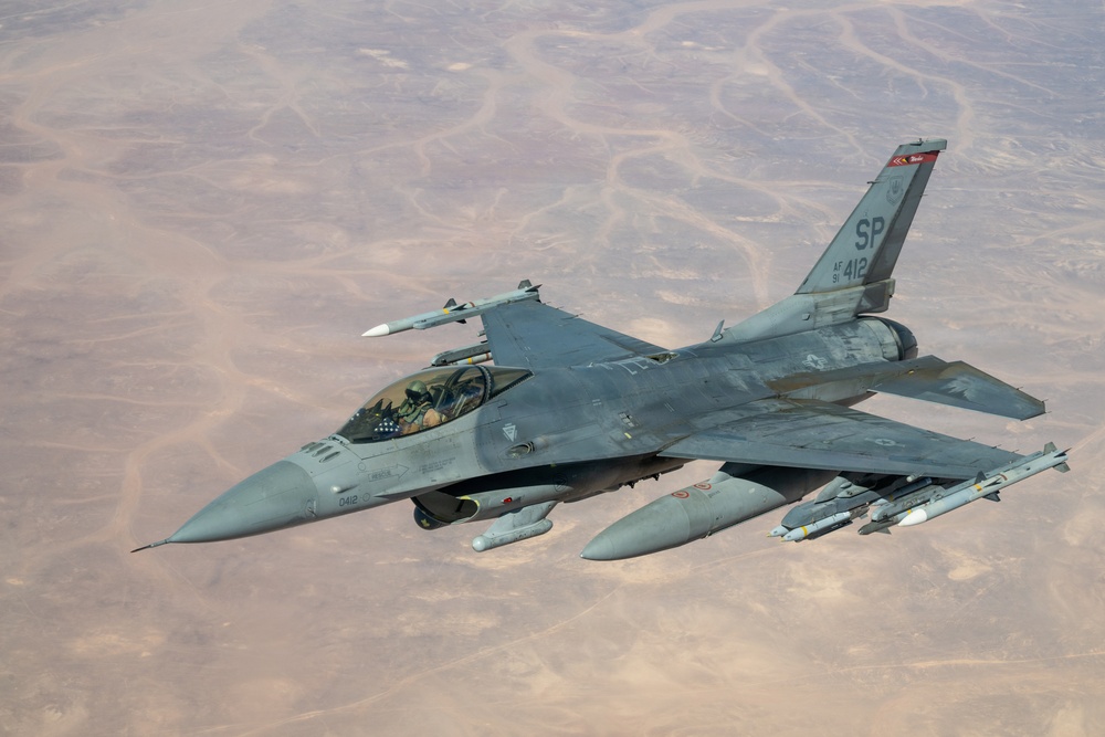 KC-135 refuels F-16s for regional security