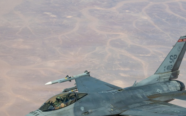 KC-135 refuels F-16s for regional security